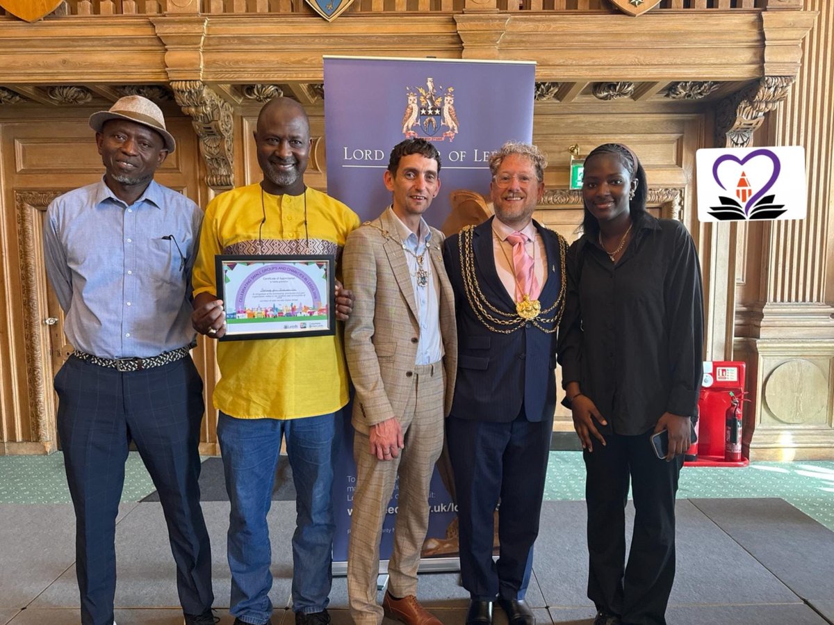Striving for Inclusion team receiving recognition from the Lord Mayor of Leeds at Leeds Civic Hall